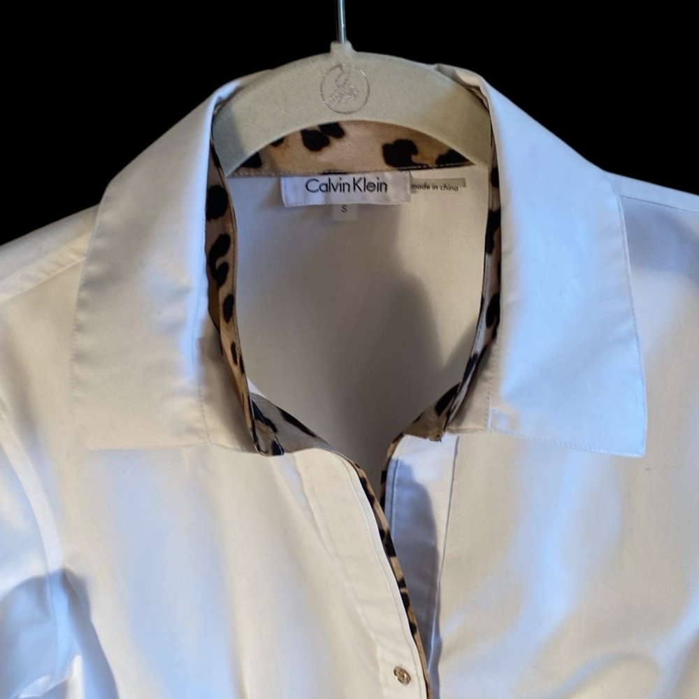 Calvin Klein crisp white blouse with animal print details. Size Small